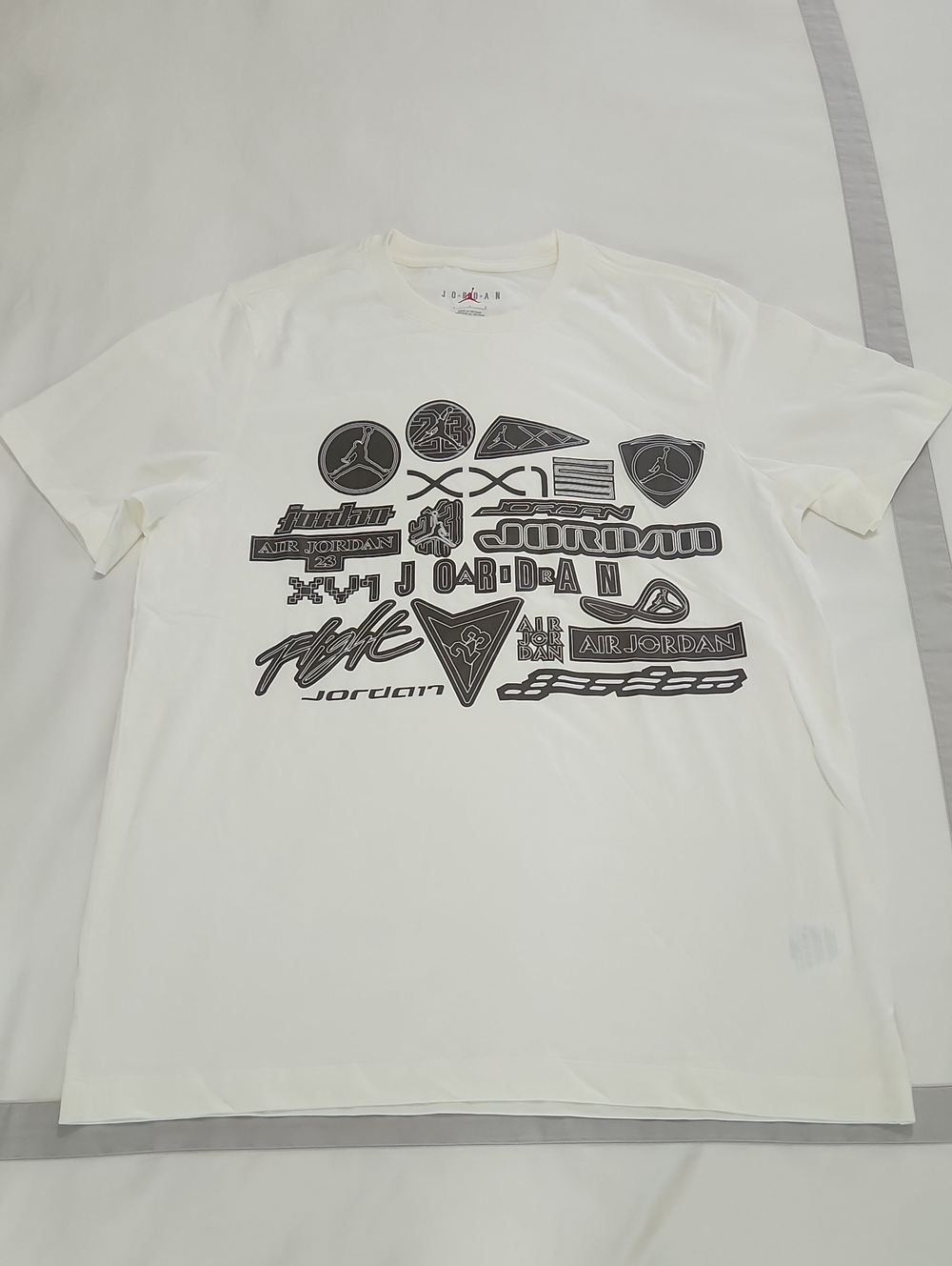 Men's Jordan Cream Short-Sleeve Graphic Logo Tee